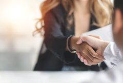 Businesswoman handshake and business people. Successful business concept.